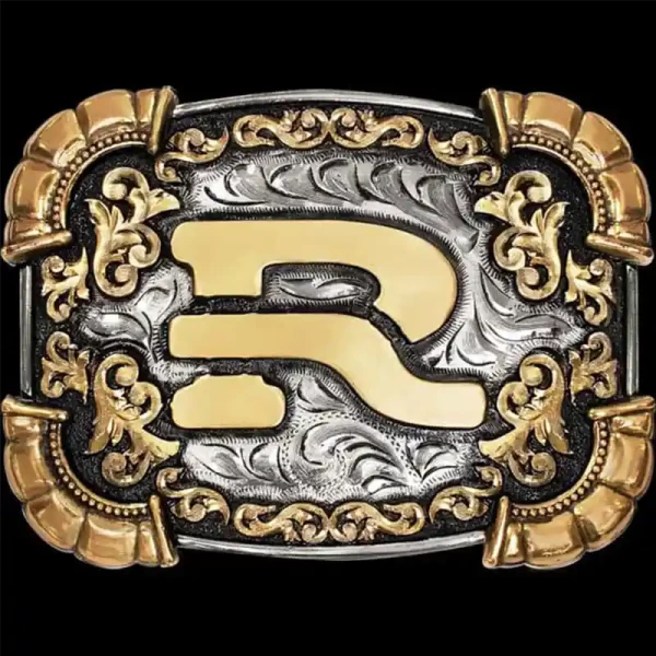 Our Joey Belt Buckle is inspired by our iconic Ryan Buckle. Handcrafted on a German Silver base, it features a clean straight-line edge, Jeweler's Bronze corners, and Western-inspired scrollwork. Measuring 3 1/2 by 2 1/2 inches, there’s ample space to add